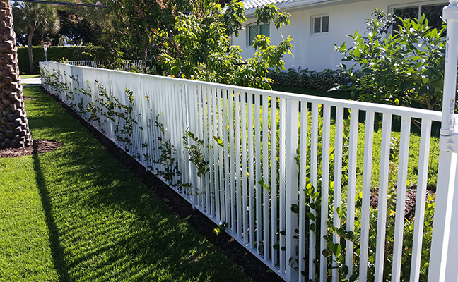 white aluminum fence around garden in jupiter florida